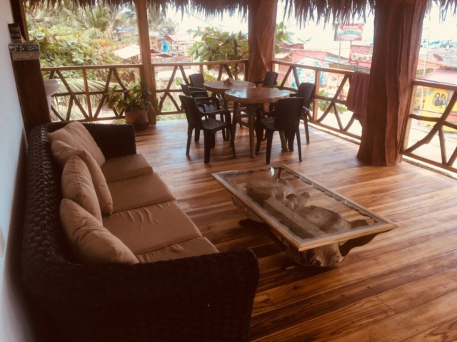 Relax on the balcony with a view of the beach